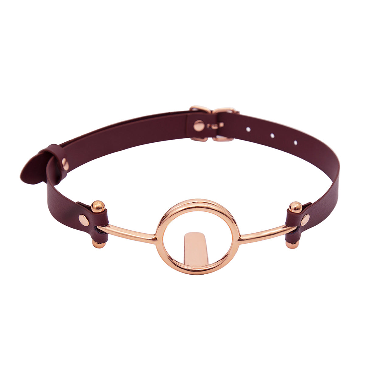 Close-up of luxurious gold metal O-ring tongue depressor gag with black premium vegan leather straps for oral bondage and deepthroat training by Sexy Maker.