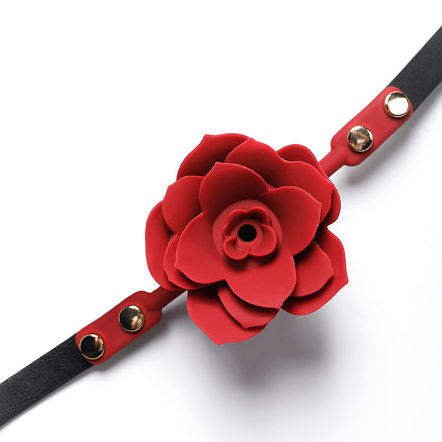Close-up of breathable red silicone rose ball gag with adjustable vegan leather straps for aesthetic BDSM play by Sexy Maker.