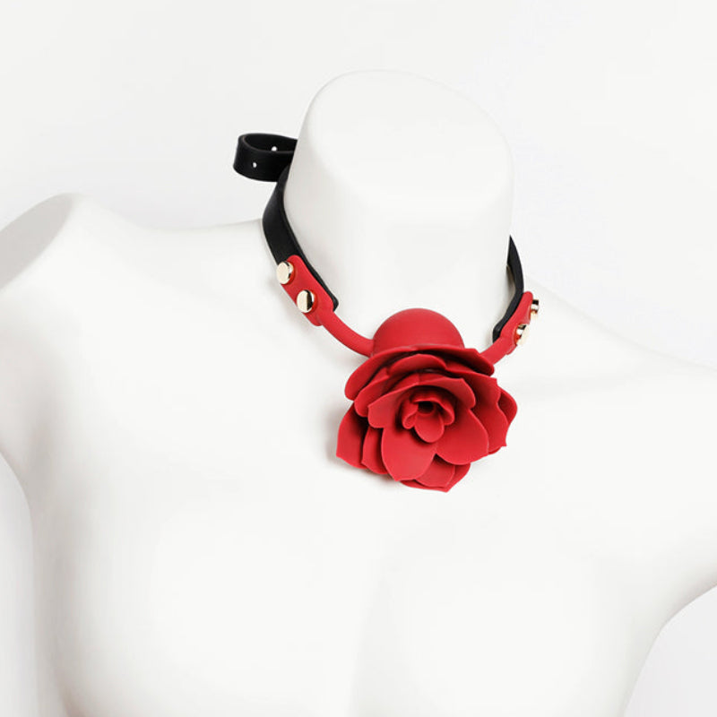 Close-up of breathable red silicone rose ball gag with adjustable vegan leather straps for aesthetic BDSM play by Sexy Maker.