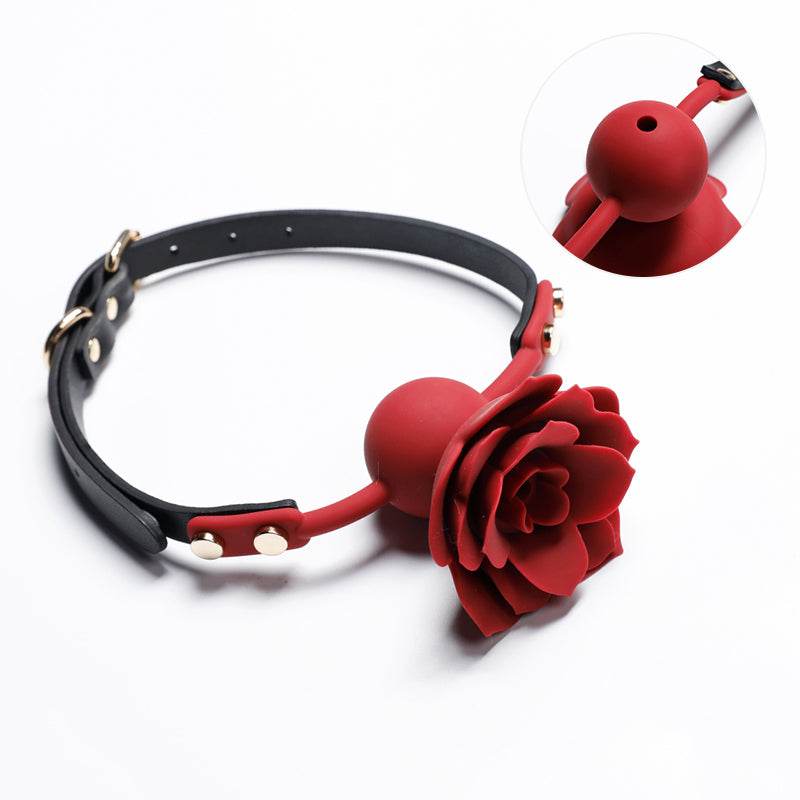 Close-up of breathable red silicone rose ball gag with adjustable vegan leather straps for aesthetic BDSM play by Sexy Maker.