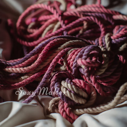 Purple pink jute Shibari rope used in chest harness bondage photography