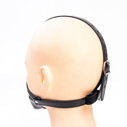 Profile view of glossy vegan leather head harness ball gag mask for forced open mouth BDSM restraint, available in multiple colors by Sexy Maker.