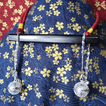 Authentic Japanese BDSM wood gag with crimson red jute rope and sensory bells for Shibari and Kinbaku roleplay by Sexy Maker.