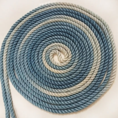 Close-up of ready-to-use blue gradient 6mm hand-braided jute Shibari rope by Sexy Maker, pre-treated and singed to prevent rope burn.